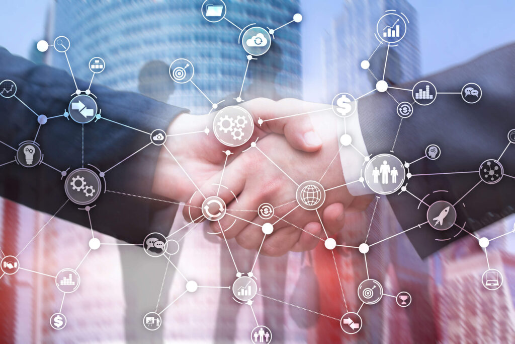 Aperto de mãos entre executivos simbolizando parceria empresarial, com ícones digitais de inovação que mostram uma operação integrada com princípios de responsabilidade dos negócios.